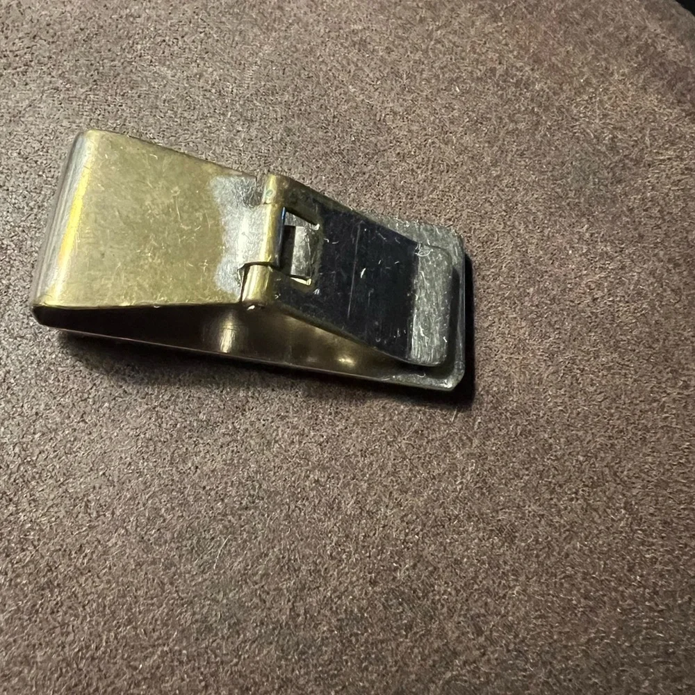 Adjustable money clip.
